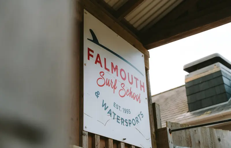 Falmouth Surf School and Watersports sign