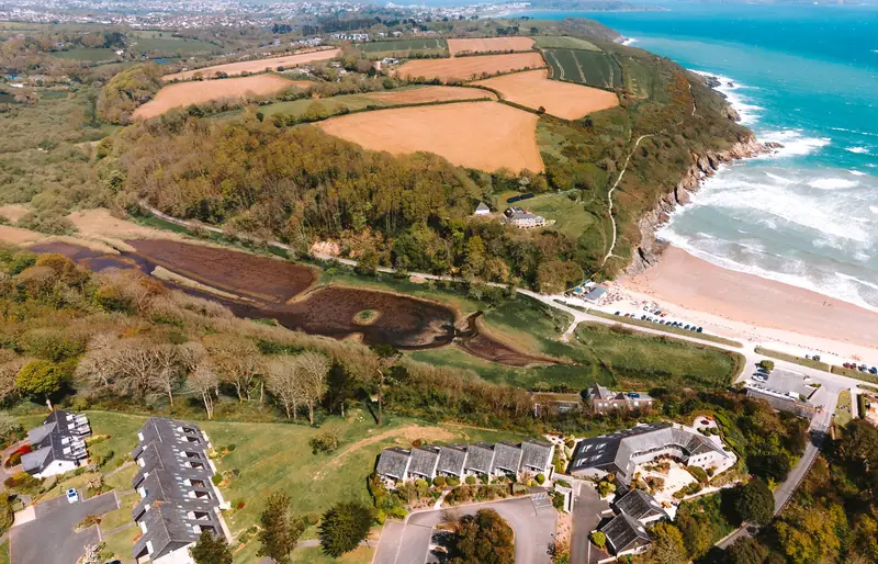 Aerial view of Maenporth Beach and the coastline