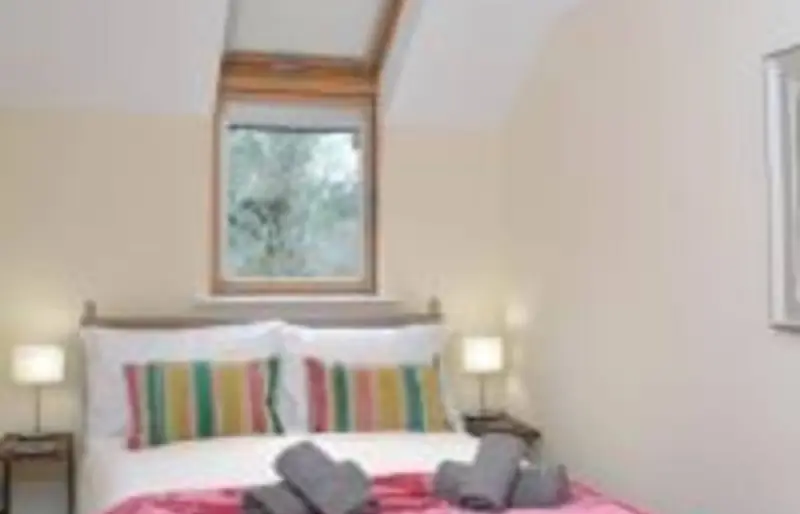 Bedroom with striped cushions