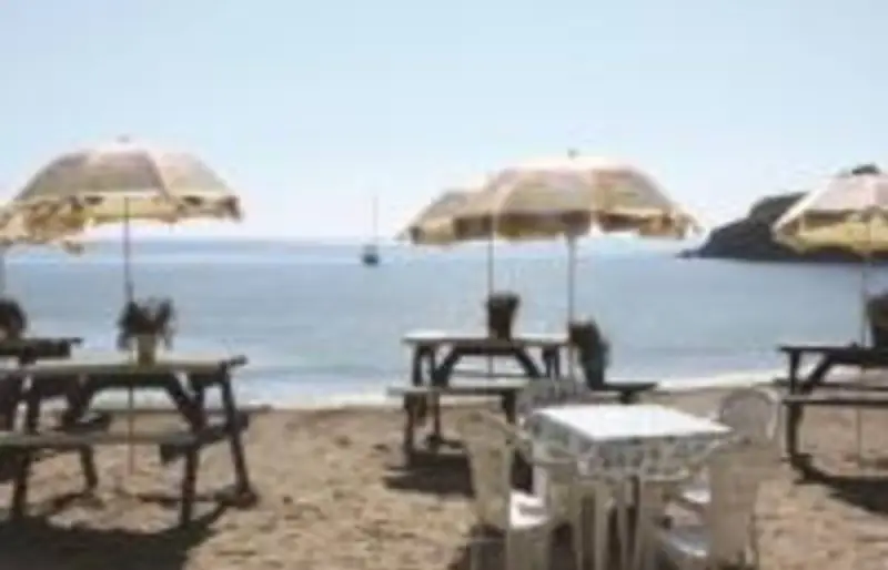 Beach cafe tables at Maenporth Beach