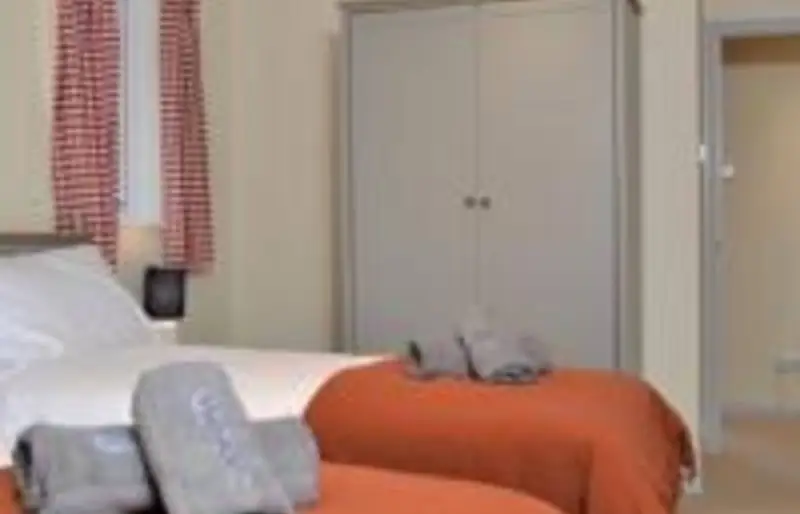 Twin bedroom with two single beds